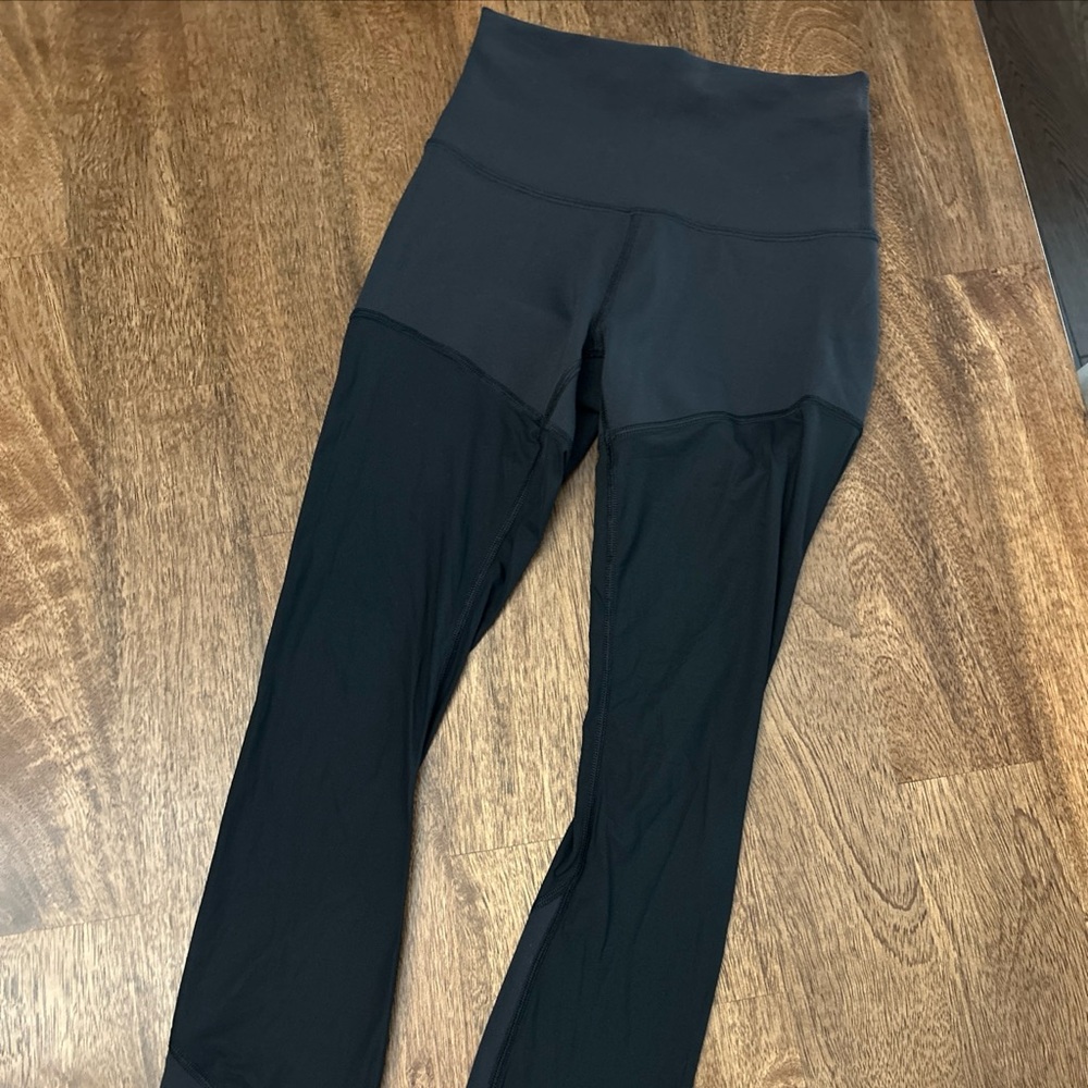 lululemon athletica Black Leggings with sheer panels sz 2 RARE Like new